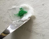 wax and green pigment